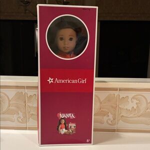 American Girl Doll with Pink and Red Box-  Nanea